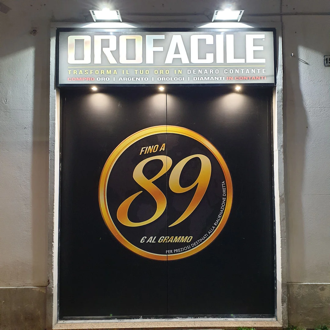 Compro oro Bologna di Via Emilia Ponente, 157: ingresso negozio compro oro a Bologna  vetrina logo oro 89€/grammo a Bologna